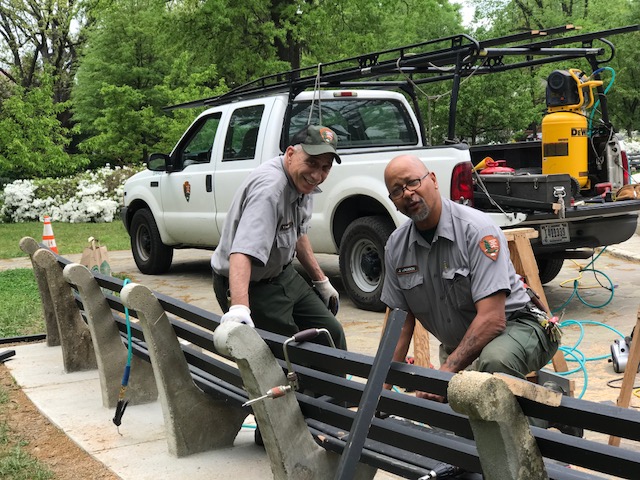 Park service fixing benches.